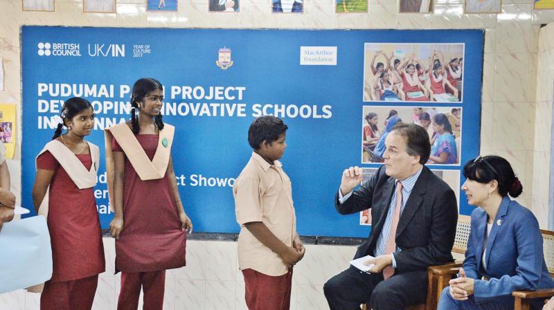 Mark Field, UK minister of state for the foreign and commonwealth office, interacts with a student of a corporation school at Mylapore on Wednesday.  (Photo: DC)