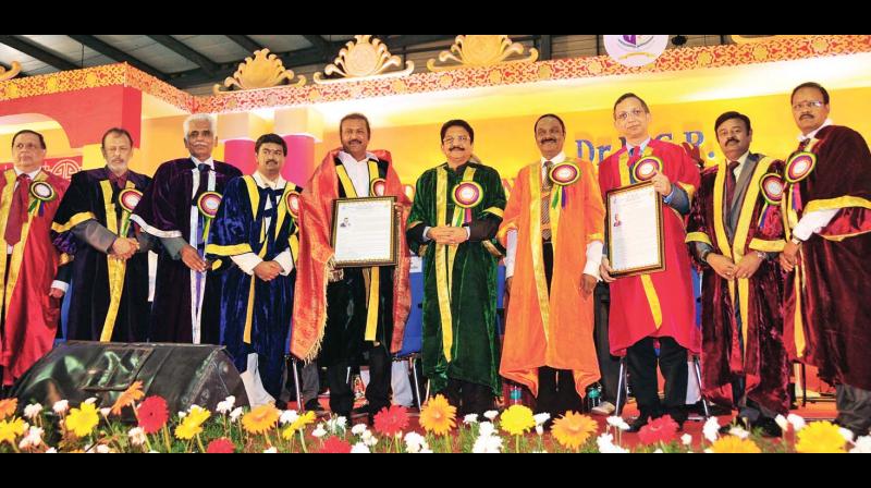 Doctorate conferred on Nuclear Power Corporation of India Technical director S. Singha Roy and actor Mohan Babu at the 26th convocation of Dr MGR Educational and Research Institute University in Chennai on Wednesday.	(Photo: DC)