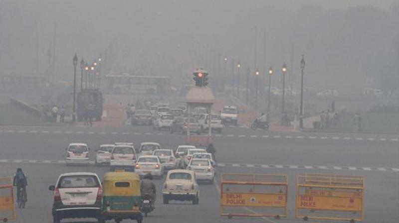 A view of Rajpath covered in smog in New Delhi on Friday. (Photo: PTI)