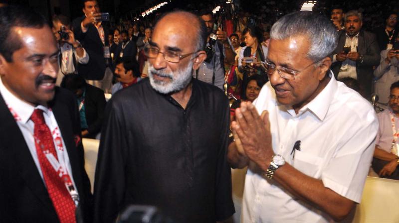 Chief Minister Pinarayi Vijayan along with Union Minister of State for Tourism Alphons Kannanthanam and KTM past president E.M Najeeb during the inauguration of Kerala Travel Mart in Kochi on Thursday. (Photo:SUNOJ NINAN MATHEW)