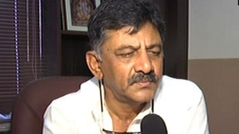 Senior Congress leader D K Shivakumar said that Congress and JD(S) have to sort out their differences for sake of forming secular government in Karnataka. (Photo: ANI)