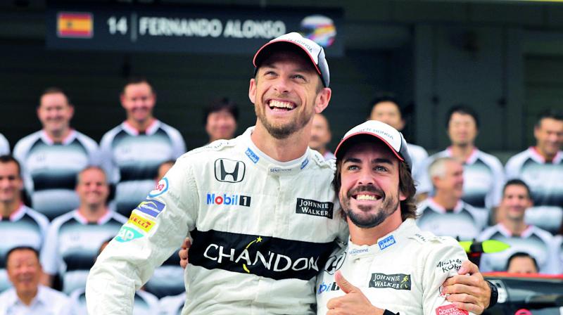 Jenson Button (left) and Fernando Alonso. (Photo: AP)