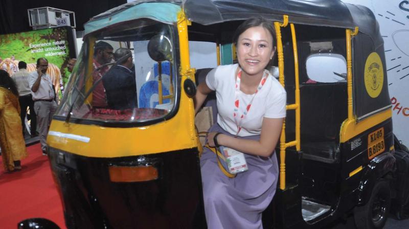 A buyer experiences an autorickshaw at the Kerala Travel Mart 2018 at Willingdon Island in Kochi on Friday.  (Photo:SUNOJ NINAN MATHEW)