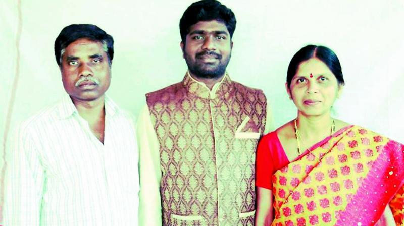 File photo of Poosa Sai Krishna with his father Yellaiah and  mother Shailaja.