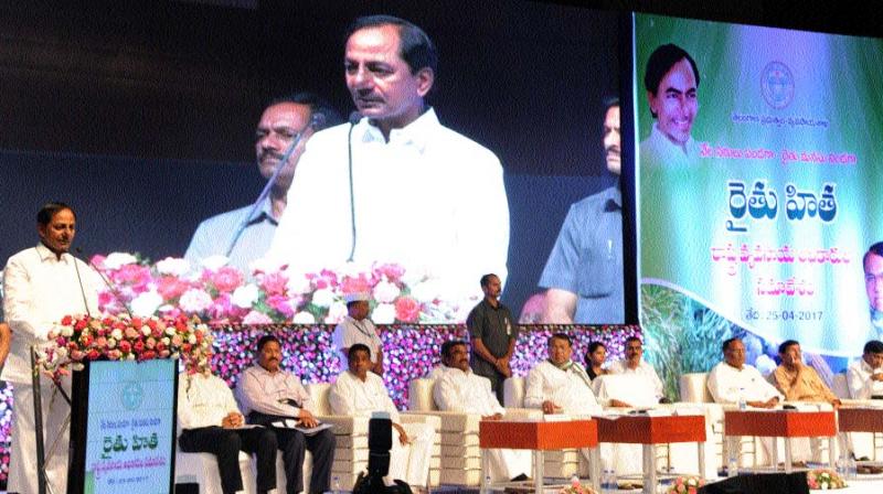 Chief Minister K. Chandrasekhar Rao addresses the state-wide agricultural officers and farmers meet at HICC in Hyderabad on Tuesday.