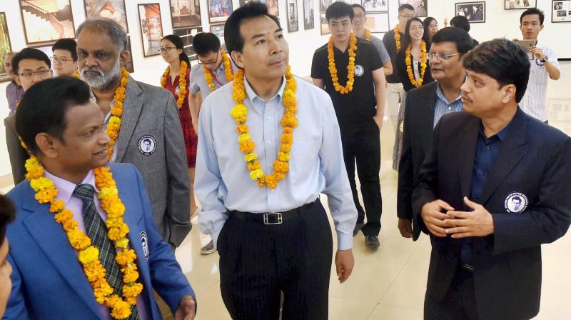 Chinese Ambassador to India Luo Zhaohui, accompanied by delegation, visits a commemorative exhibition on Dr Dwarkanath Kotnis titled \Legacy of Legend 2017\ in New Delhi on Thursday. (Photo: PTI)