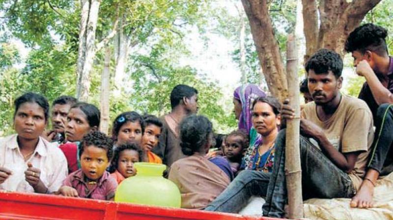 A file photo of tribals being taken to Bedagudda from Diddalli forest in Kodagu