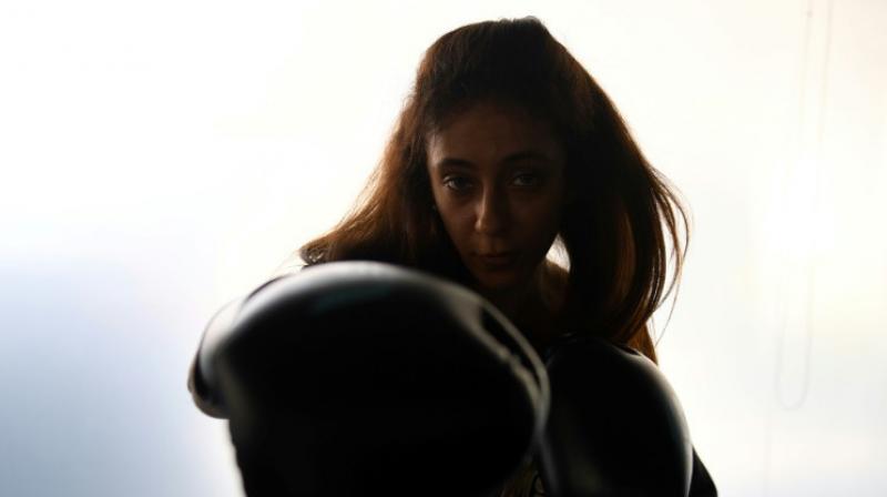 Relying on word-of-mouth publicity in a country where exercising in public is culturally deemed unbecoming for women, Halah Alhamrani is working to empower a generation with little to no exposure to sports. (Photo: AFP)