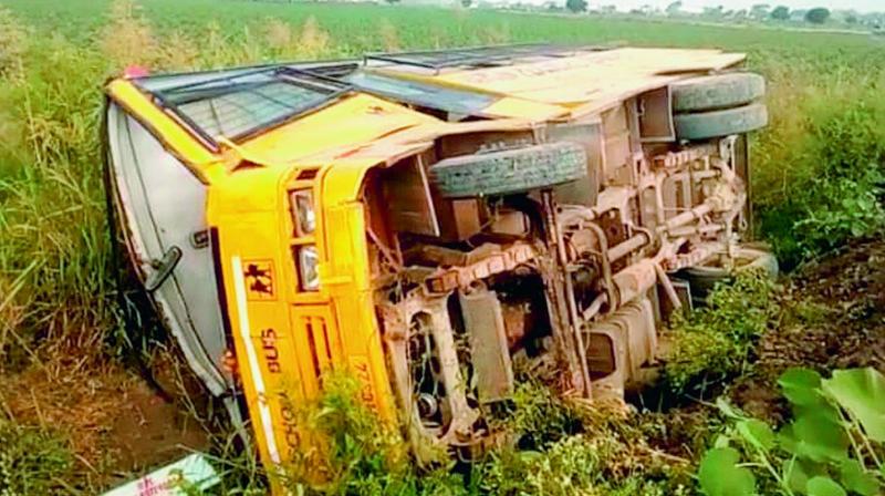 The school bus carrying 40 students from Gogulapadu to Dachepalli rolled over at Allugumillupadu of Guntur district on Wednesday.