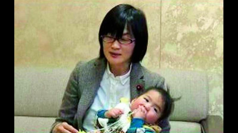 Yuka Ogata with her son.