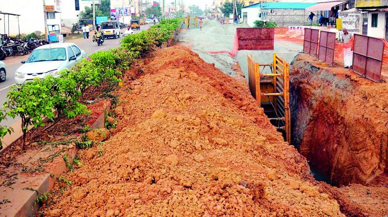 Road in B.V. Nagar dug up during the underground drainage works in Nellore city.