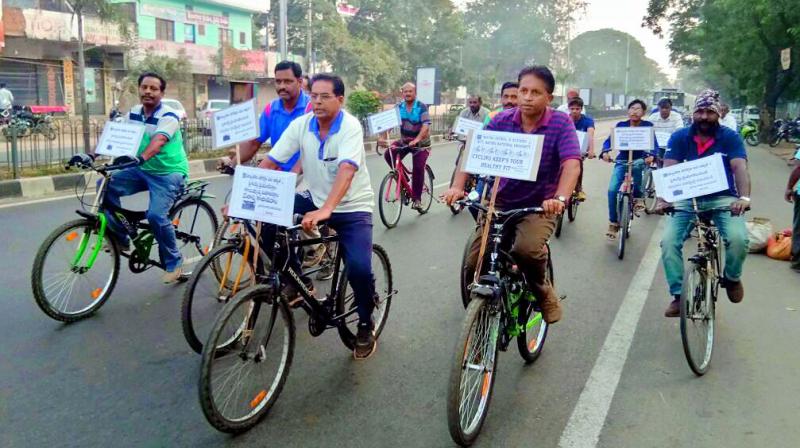 Tricities walkers association members riding bicycles as part of the rally in Warangal on Sunday. (Photo: DC)