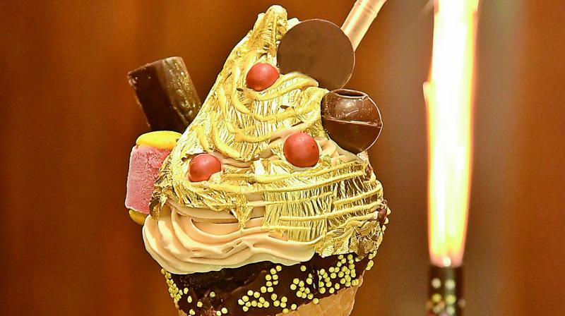 The ice cream, which boasts of 18 other elements, definitely stands out because of the fine 24 carat gold sheet that tops it off like a boujie cherry.