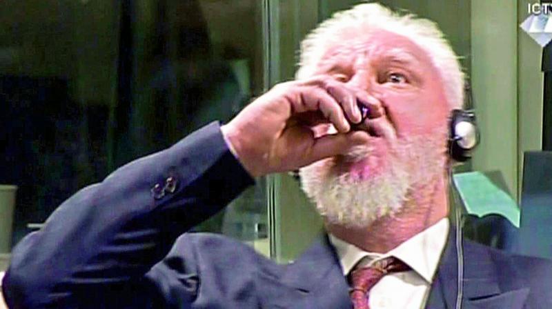 A videograb shows  Slobodan Praljak swallowing poison. (Photo: AFP)