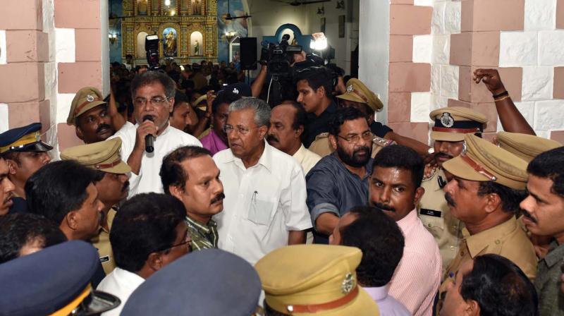 Chief Minister Pinarayi Vijayan visits Vizhinjam church on Sunday. (Photo: DC)