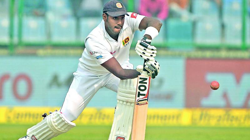 Angelo Mathews en route to his knock of 111 against India on Monday. (Photo: AFP)