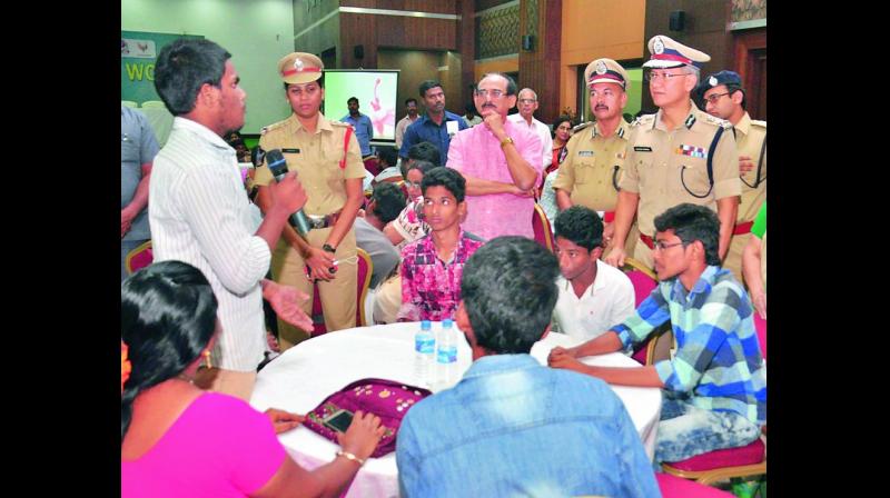 Commissioner of police D. Gautam Sawang interacts with eve-teasers at the counselling session in Vijayawada on Monday. (Photo: DECCAN CHRONICLE)