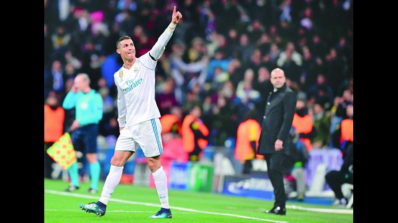 Cristiano Ronaldo of Real Madrid celebrates scoring against Borussia Dortmund at Santiago Bernabeu in Madrid. Real won 3-2. (Photo:  AFP)
