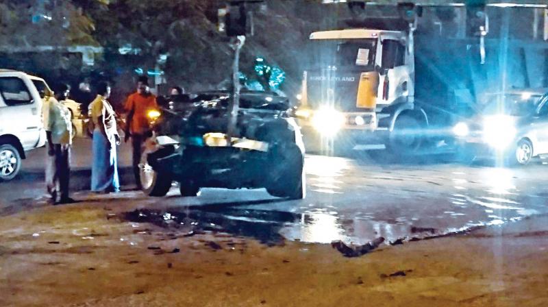 The director was driving his Mercedes Benz and the vehicle was mangled after he rammed onto a central median while attempting to avoid hitting a tanker lorry ahead of him, police said.