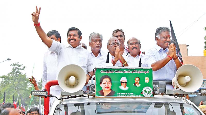 Chief Minister Edappadi K. Palaniswami and Deputy CM O. Panneerselvam campaign for AIADMK candidate Madusudhanan in RK Nagar, on Thursday.(Photo: DC)