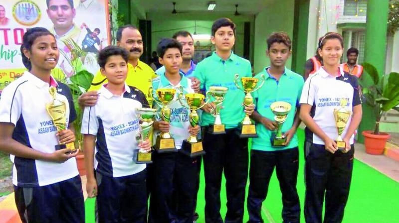 Winners and runners-up pose with their trophies at the 31st Sub-Junior National Badminton Championships at Tenali in Andhra Pradesh.