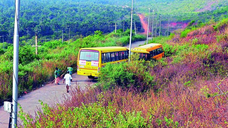The damaged buses of private schools in Yarada area in Visakhapatam.