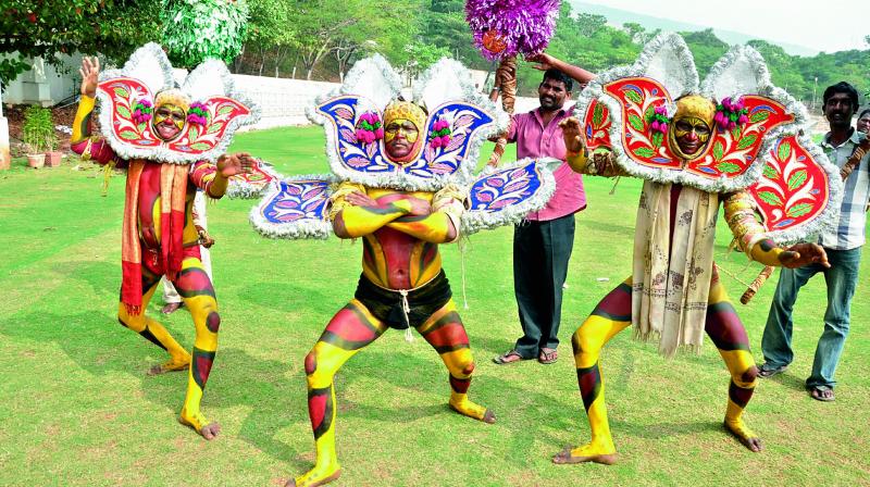 A team from North Andhra performs puli veshalu during the inaugural match of VJF-ViSJA inter-media cricket tournament at Port Stadium in Visakhapatnam on Wednesday. (Photo: DC)
