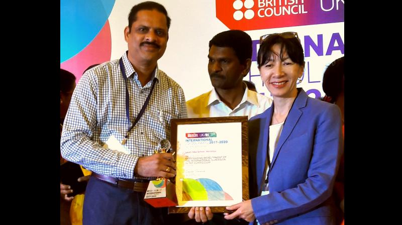 Correspondent Challa Raghunath Reddy receives the ISA award in Chennai.