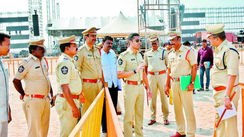 East Godavari District Superintendent of Police Vishal Gunni inspects the security arrangements ahead the festival in Kakinada on Monday. 	(Photo: DC)