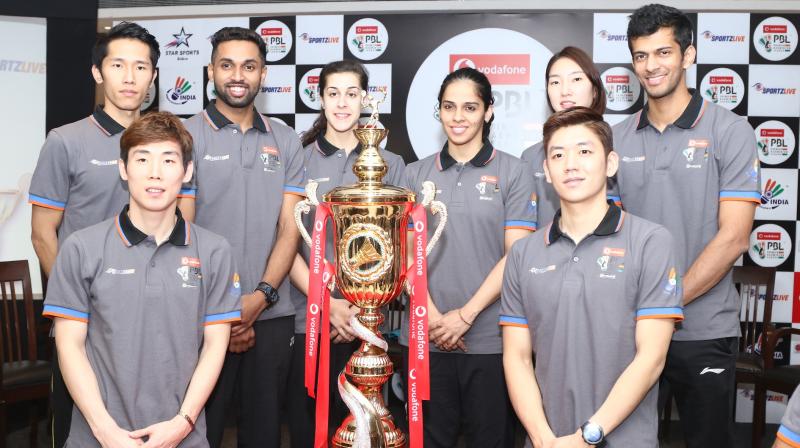 Saina Nehwal, Carolina Marin, Lee Yong Dae, Son Wan Ho, H. S. Prannoy, Sung Ji Hyun, Ajay Jayaram and others at unveiling of the PBL trophy in New Delhi. (Photo:  PTI)
