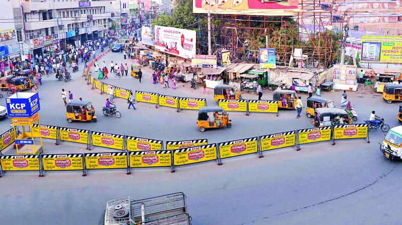 Newly installed barricades allow free flow of traffic to take a free left turn at Naaz Center, Guntur city on Thursday. (Photo: DC)