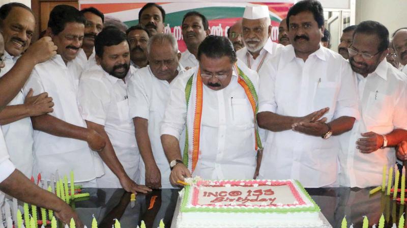 KPCC president M.M. Hassan cuts the cake marking the birthday celebration of  Indian National Congress at Indira Bhavan in Thiruvananthapuram on Thursday. (Photo: DC)