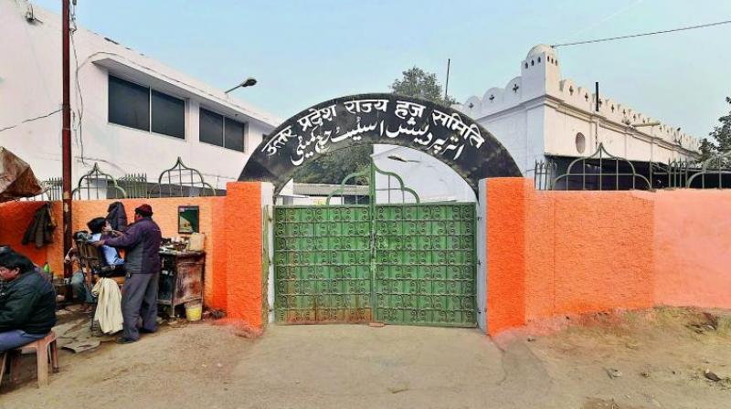 BJP government painted the outer wall of the UP State Haj Committee office in saffron, at Lucknow on Friday. (Photo: PTI | File)
