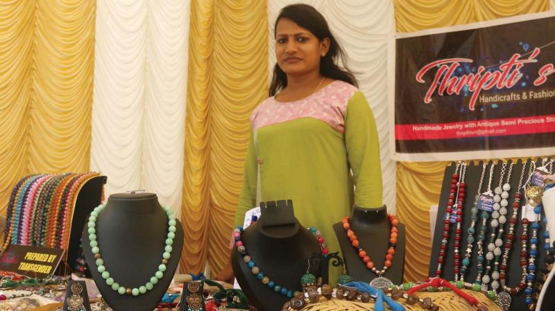 Thripthi Shetty, the first transgender person to register under Handicrafts Development Corporation of Kerala and receive an artisans ID card from the Union Ministry of Textiles in her stall at Public Office Complex. (Photo:DC)