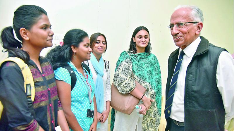 Retired IPS officer and author of the book The Naxalite Movement in India, Prakash Singh interacts with students at CESS Ameerpet on Thursday.