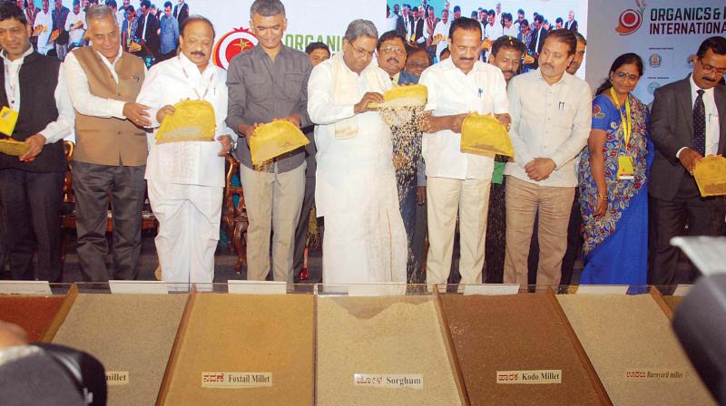 Chief Minister Siddaramaiah inaugurated the Organics and Millets 2018 International Trade Fair at Palace Grounds in Bengaluru on Friday. Union Minister DV Sadananda Gowda, ministers Krishna Byregowda, Roshan Baig are also seen. (Photo:KPN)