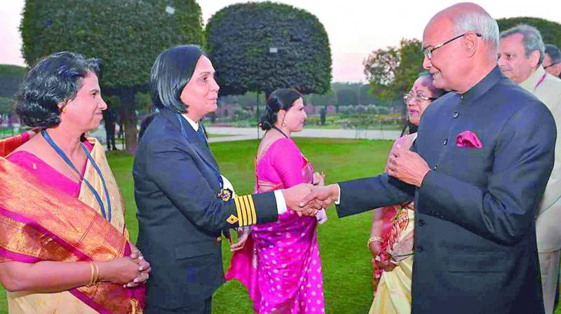 Capt. Radhika Menon with President Ram Nath Kovind during First Woman Achiever Awards at Rashtrapati Bhavan, Delhi