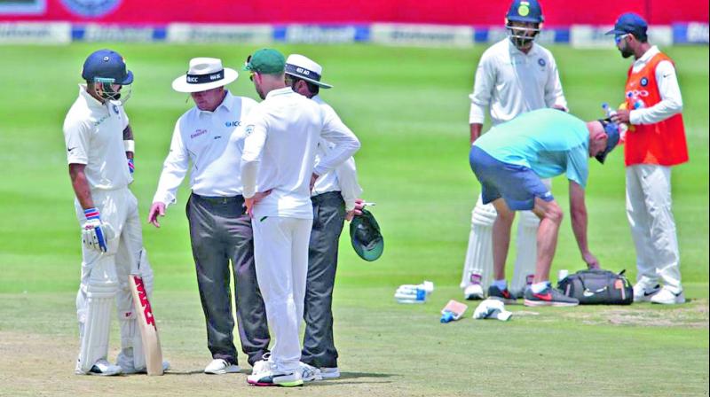 On-field umpires in discussion with India skipper Virat Kohli and his SA counterpart Faf du Plessis regarding the nature of the Wanderers pitch. (Photo:BCCI)