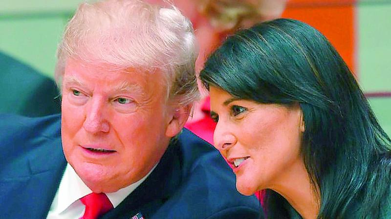 A file picture of US President Donald Trump and US ambassador to the UN Nikki Haley