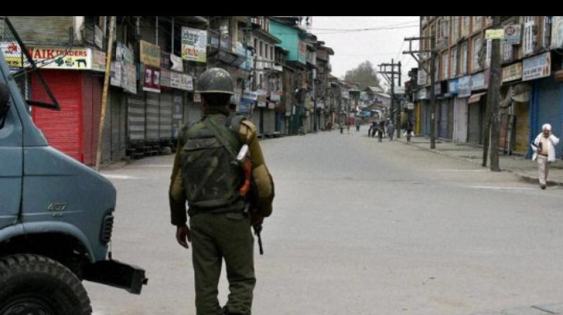 Shops and business establishments remained closed in most parts of Kashmir while public transport was off roads due to the strike. (Photo: PTI)