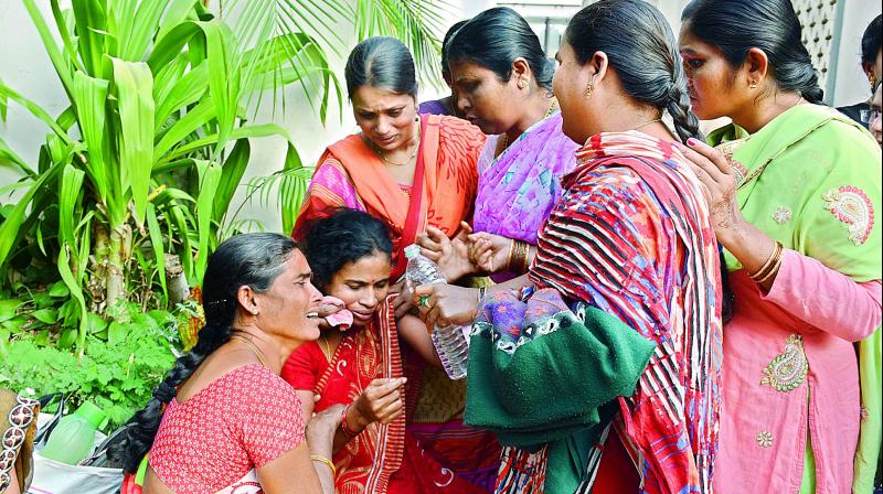 Ramavath Nayaks wife and relatives mourn his death at Kamineni Hospital where he breathed his last on Sunday. (Photo:DC)