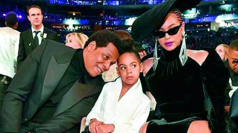 The six-year-old sat in the front row with her parents Beyonc© and Jay-Z.