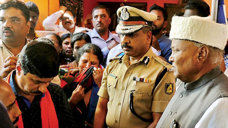 City Police Commissioner T Suneel Kumar, MLA Narayana Swamy, former minister Katta Subrahmanya Naidu and others with Santoshs mother. (Photo:DC)