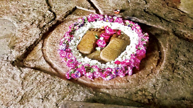 The footprints symbolize the stay of Bhadrabahu who lived and died here.