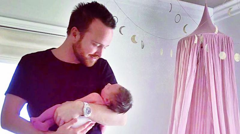 Aaron Paul and his wife Lauren are still celebrating the birth of their first child who was born last week.