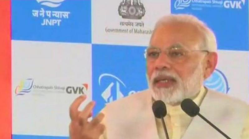 Narendra Modi dedicated the first phase of the Rs 7,900-crore 4th terminal project of the JNPT to the nation, which will raise the cargo handling capacity of the nations largest container port by 50 per cent. (Photo: ANI/Twitter)
