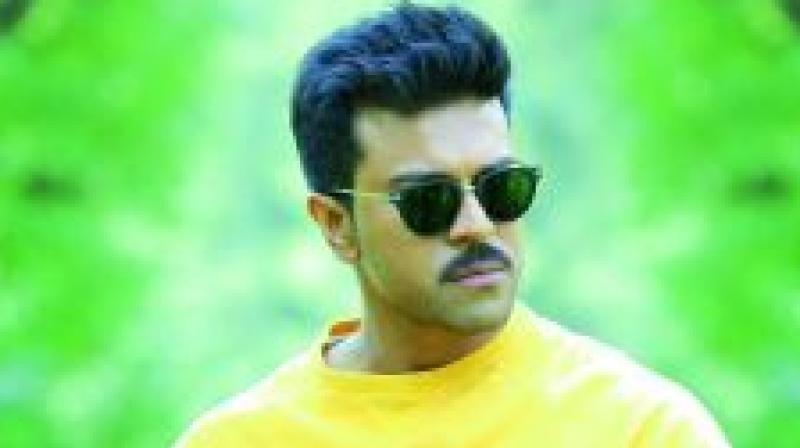 Candid video of Ram Charan flaunting his new hairstyle goes viral