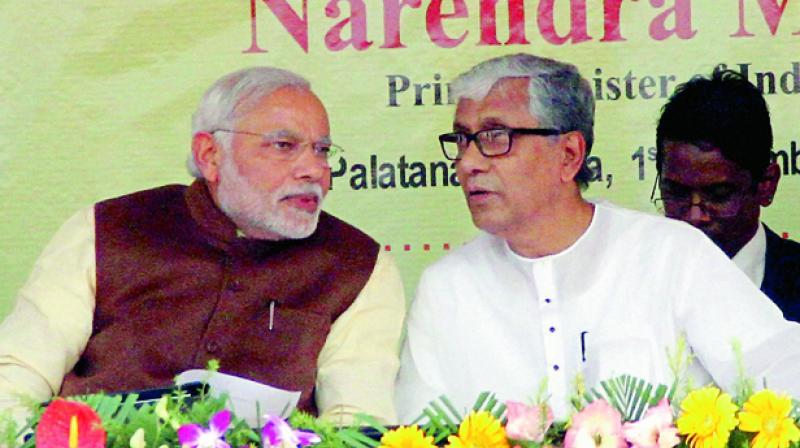 In the image, Prime Minister Narendra Modi (L) and Manik Sarkar (R). (Photo: File | PTI)