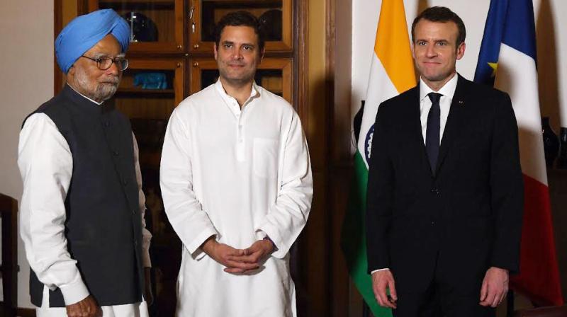 French president Emmanuel Macron met Congress chief Rahul Gandhi and former prime minister Manmohan Singh on Sunday. (Photo: Twitter/@OfficeOfRG)