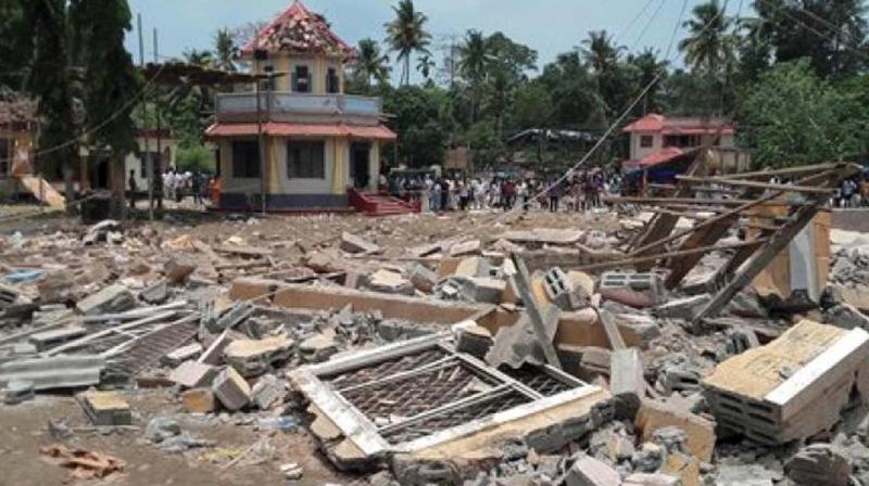 A view of a collapsed building after a massive fire broke out during a fireworks display at Puttingal temple complex in Paravoor village killing 102. (file pic)